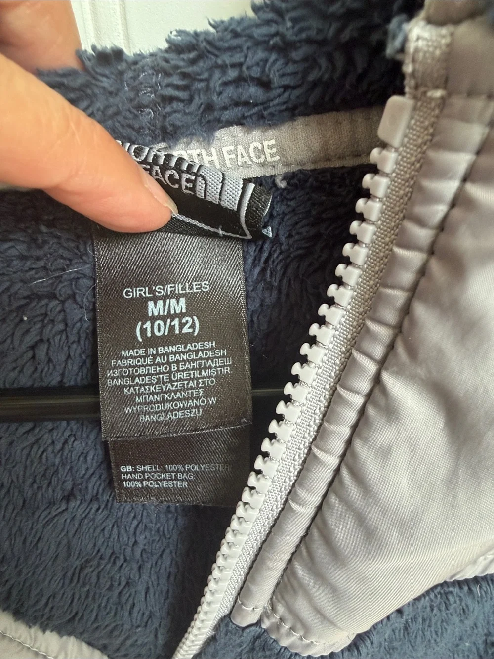 (307)The North Face Navy and Gray Kids Fleece Jacket